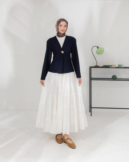 veste à bouton doré