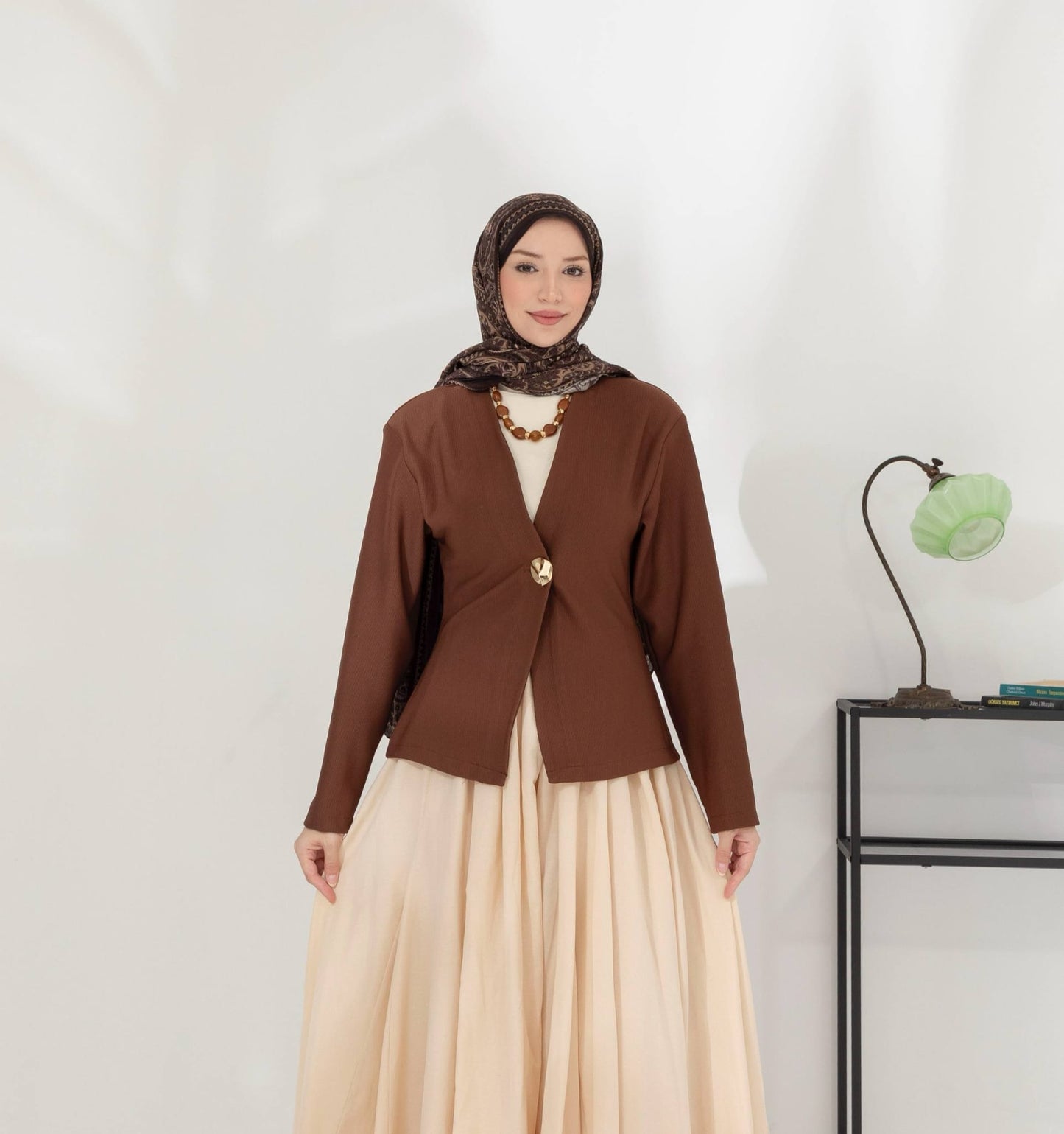 veste à bouton doré