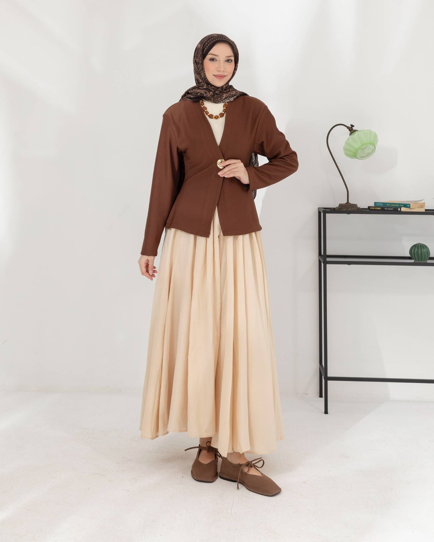 veste à bouton doré