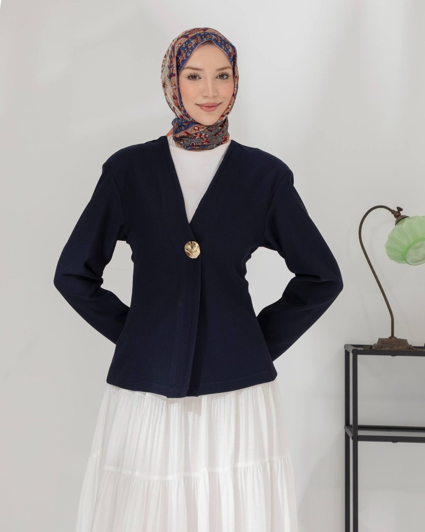 veste à bouton doré