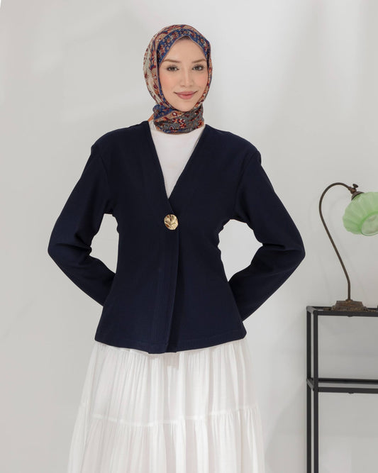 veste à bouton doré