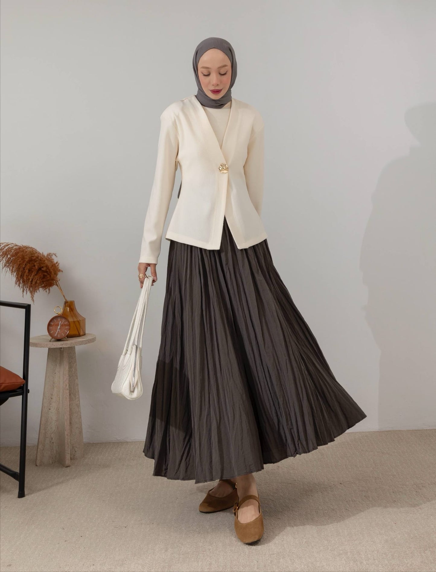 veste à bouton doré